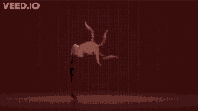 a cartoon character is doing a handstand on a red background with a star on her head .
