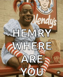 a wendy 's sign with a picture of henry where are you on it