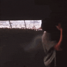 a blurry picture of a man wearing a nike t-shirt