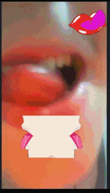 a close up of a woman 's mouth with a pink heart on top of it