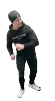 a man wearing a black hoodie with the word clothing on it dancing