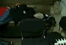 a person is laying on a chair with the word rbd written on the bottom right corner