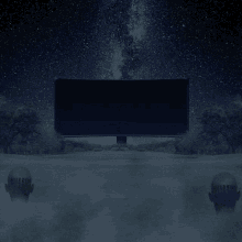 a billboard in the middle of a field with a starry sky in the background
