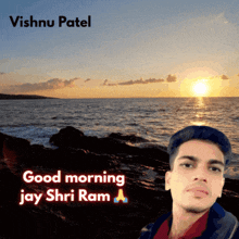 a young man stands in front of the ocean with the words good morning jay shri ram above him