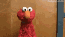 Elmo Idk GIF - Elmo Idk Shrug GIFs