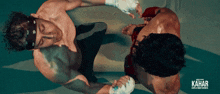 a poster for kahar shows two boxers fighting
