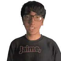 a young man wearing glasses and a black shirt that says jaime