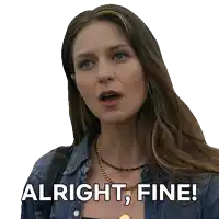 a woman wearing a denim shirt and necklace says " alright fine "