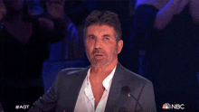 Give A Wink Simon Cowell GIF - Give A Wink Simon Cowell America'S Got Talent GIFs