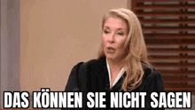a woman is sitting in front of a microphone with the words das können sie nicht sagen written on the screen .