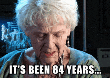 an elderly woman with the words it 's been 84 years written on her face