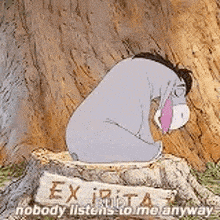 eeyore is sitting on a tree stump .
