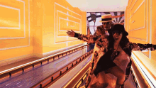 a man and a woman are standing on a roller coaster