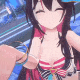 a close up of a girl in a bikini taking a selfie