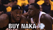 two basketball players are looking at each other with the words buy naka written on the bottom