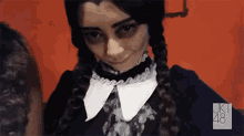 a woman in a costume with uk 48 written on the bottom