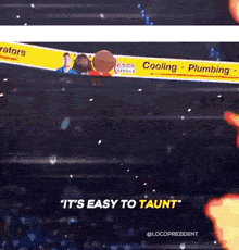 a basketball is being thrown over a banner that says it 's easy to taunt .