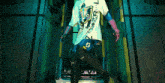 a person wearing a t-shirt with a face on it and the letter l on it