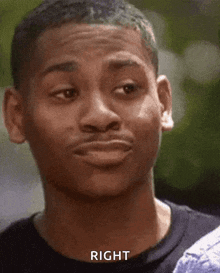 a young man is making a funny face and the word right is on the bottom of the image .