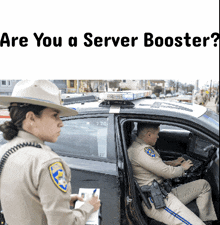 a woman in a cowboy hat stands next to a police officer in a car with the words are you a server
