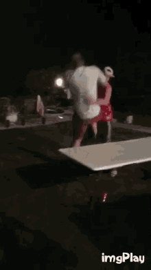 a blurry picture of a table with images play written on the bottom
