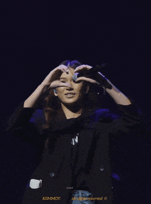 a photo of a woman on a stage taken by kimmoy