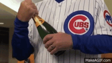 cubs chicago cubs world series celebrate pop the cork