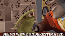 a toy story character talking on a cell phone next to a green monster that says " seems we 've underestimated "