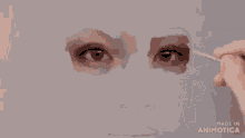 a close up of a person 's face with the words made in animotica on the bottom right