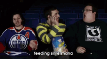 Feeding Of Silvermana GIF - Popcorn Movie Feeding GIFs