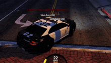 a video game shows a police car with the number 232 on the back