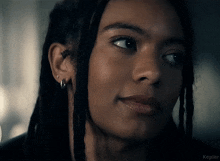 a close up of a woman 's face with the word kepler on the bottom right