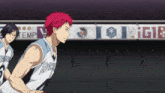 two basketball players in front of a banner that says emp on it