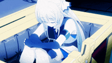 a girl with white hair and blue gloves is sitting in a box with her head down
