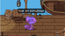 a purple pony is standing on a wooden deck with a sign that says hop on ponytown above it