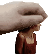 a hand is holding a woman 's head in a pixel art style .