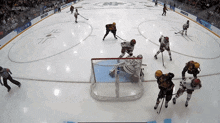 a hockey game is being played on espn 's ice