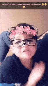 a young boy wearing glasses and a flower crown says joshua 's italian side came out at the end on the bottom