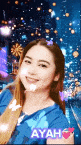 a woman in a blue shirt with the word ayah above her head