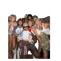 a group of people are posing for a picture with one wearing a usa shirt