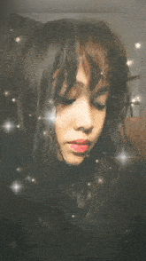 a picture of a girl with red lipstick and a gray background