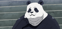 a panda bear with a serious look on his face