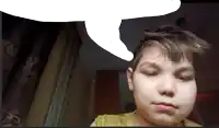 a young boy looks at the camera with a speech bubble behind him