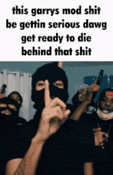 a man wearing a ski mask holds his finger to his mouth and says this garrys mod shit be gettin serious dawg