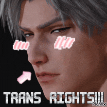 a close up of a man 's face with the words trans rights on it