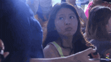 a woman stands in a crowd of people with a watermark that says vfx