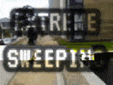 a blurry picture of a sign that says sweeping