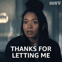 a woman says " thanks for letting me " in front of her face