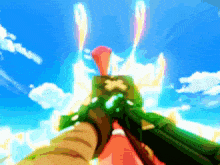 a blurry picture of a person holding a sword in front of a blue sky