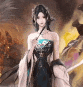 a woman in a black dress is holding a sword in front of a burning building .